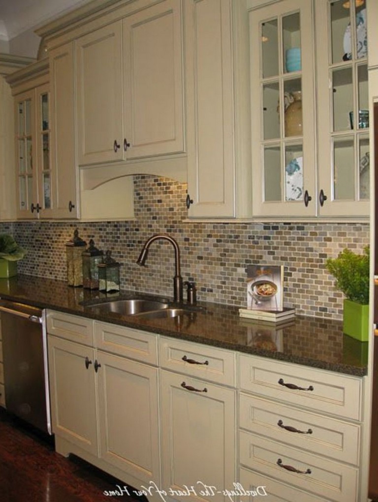 light kitchen cabinets and darker wall or dark kitchen cabinets with lighter walls